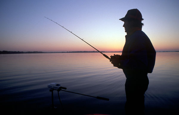 A fisherman symbolizes the use of social media to attract visitors to your website